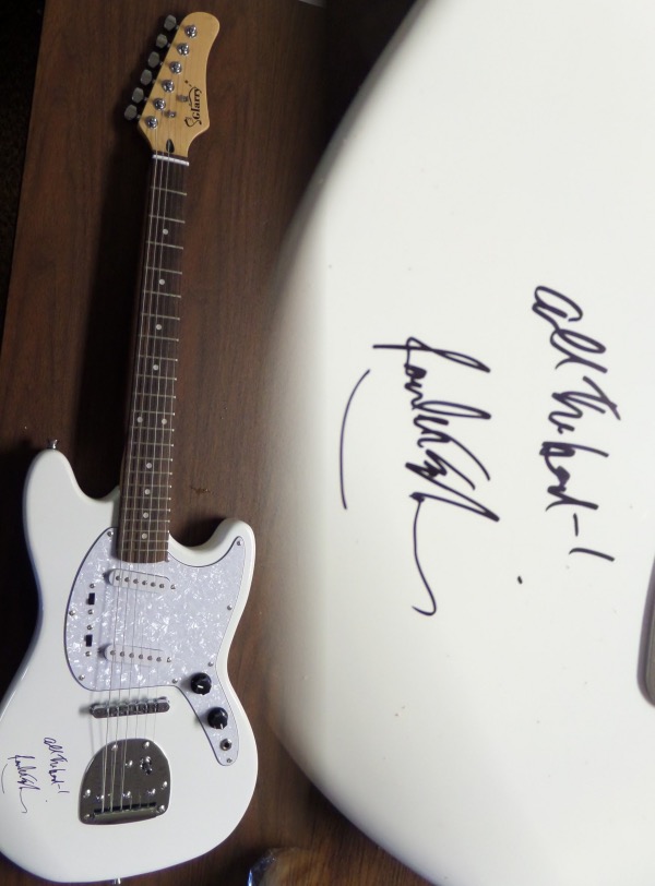 This gorgeous all white mint electric Glarry guitar comes with the original box, pick ups, bag, straps,etc. and comes signed by the best singer/songwriter of all time in black. SUPERB autograph and shows off wonderfully. Guaranteed authentic and get it now because Paul is a tough autograph and not getting any younger! He even included "All the best" above his tough-to-get signature!