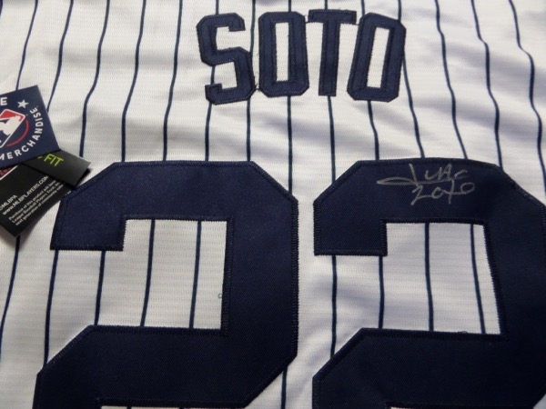 This mint authentic home white jersey comes signed superbly on the back numbers in silver by this new Yankee slugger! Great autograph and guaranteed authentic. Retails in the high hundreds and rising as he is a star in NYC. Nice!