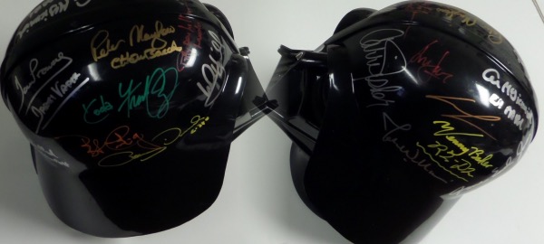 This mint black and free standing helmet is from "Darth Vader", and comes paint pen signed by many, most of which have written their movie character names. It is a gem, a clean bold and stunning 10 all over, and features high value signatures from Hamil, Lucas, Mayhew, Oz, Prowse, Ford, Fisher, Baker, Cushing and many more..wow!