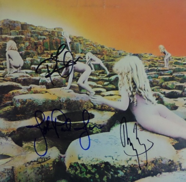 This high value item is a 1970's hit LP by the timeless band, comes cover signed in bold black and blue sharpie by all 3 with Robert Plant, Jimmy Page and John Paul Jones. "House of the Holy" is the name, grade is a bold 10 on the high value rock n' roll signatures, and value overall is in the thousands with Jones appearing.  