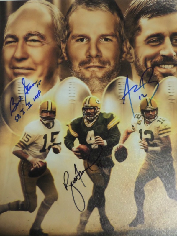 This stunner is 18x24 in size, well done in full color, and on real canvas. It shows all 3 Packers legends in a custom image, comes black and blue sharpie signed by everyone on terrific spots, and shows off EZ from a football field away. Value is thousands for sure, and framing is a must-do!