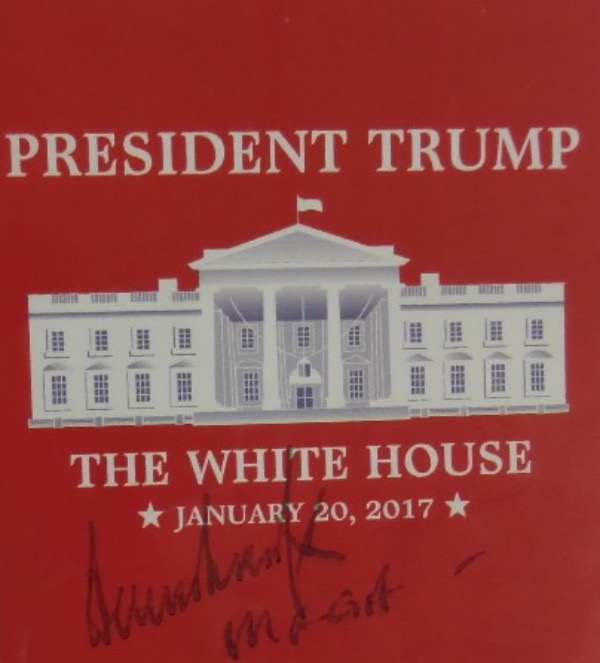 This red President Trump The White House January 20, 2017 Inauguration card measures 3.5x4 and is in NM/MT condition.  It is hand-signed in black by #45 himself, and grades a legible 6, with a MAGA inscription added.  Small in stature, but packs a powerful, political punch, and retail is high hundreds, at least!