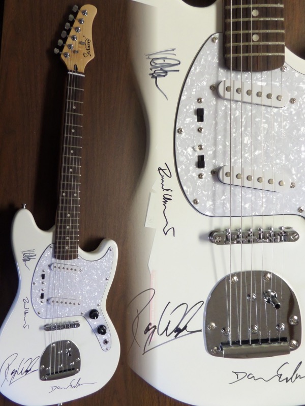 This mint electric beauty comes in the original box with all accessories included. It is STUNNING and comes signed by ROGER WATERS, DAVID GILMOUR, RICHARD WRIGHT, & NICK MASON!  All of the autographs are in great shape and this retails well into the low thousands from 1 of classic rocks all time great bands. 