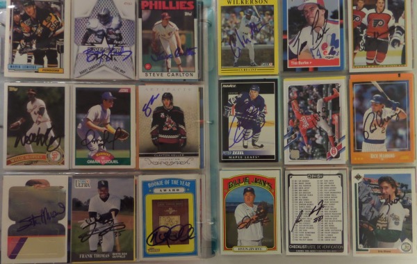 This filled binder has signed cards in pages, all come front side signed in bold sharpie, and most grade clean 10's. A copy of the auction LOA accompanies, signed cards include Steve Carlton, Frank Thomas, Stan Musial, Lemiuex, McCovey, Barry Sanders. There are many fill ins as well, guys like Devon White, Wally Backman, Dave Parker etc.  