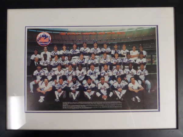 This custom piece measures 18"x24" after professional matting and framing and is in super shape and ready to hang! It comes signed by 29 members of this championship squad in blue and included are all the big names like coach Johnson, Gary Carter, Gooden, Hernandez, Strawberry, Dykstra, Mookie, Backman, Darling, Mazilli,Hojo, Knight,etc!  Show obtained years ago and AWESOME!