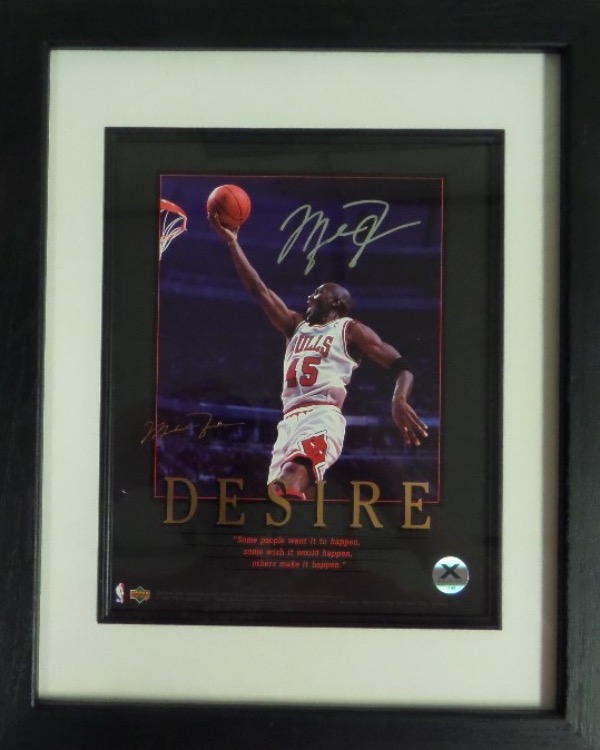 This pro matted and wood framed gem is a color 8x10 inspirational photo, shows Mike in action in his Bulls home whites, and comes silver paint pen signed perfectly in an upper corner. It is a 10 all over, has a lifetime Xcelsior hologram affixed, and value on the easy sports buy and hold investment is $2000.00..