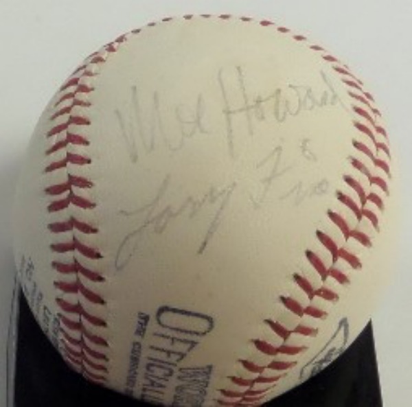 This vintage Official League baseball from Worth, though very old, is still in EX/EX+ overall condition.  It is hand-signed in what looks to be light/faded black ink on a side panel by both Larry Fine and Moe Howard, with signatures grading 5's-6's each, and with both comedy legends now long gone, retail on this collector's gem is low thousands!!!