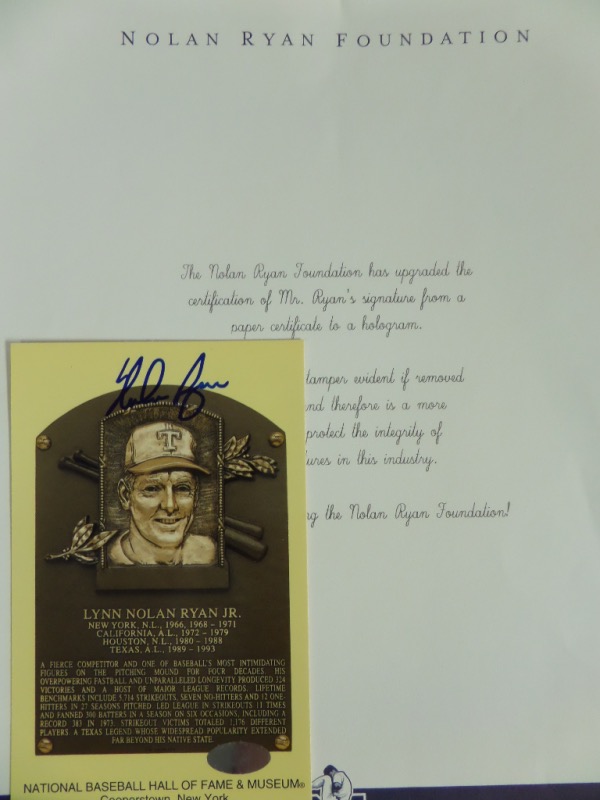 This NM yellow HOF plaque postcard of Nolan Ryan comes hand-signed in blue sharpie by the Express himself.  This is a very nice, strong signature, grading a 9 at least, and is hologrammed and accompanied by a full LOA from The Nolan Ryan Foundation for absolute authenticity.  Valued well into the hundreds!