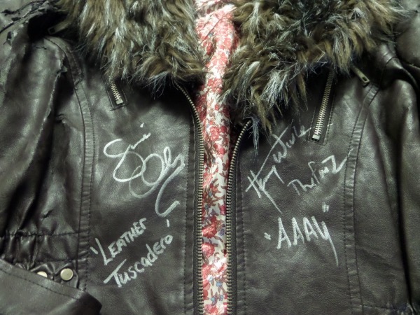 When it comes to TV collectibles, you'd be hard-pressed to find something that trumps this brown ODYN ladies size L leather jacket, in G condition, and hand-signed on the front in bright silver by "Happy Days" stars, Henry Winkler and Suzi Quatro.  These are stunning signatures, grading legible 8's or better, Winkler including The Fonz and AAAY inscriptions and Quatro including Leather Tuscadero.  A MUST for display, and with Winkler's star resurrected by the HBO show "Barry," retail is very high hundreds, at least!