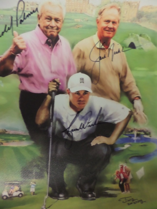 This real canvas is the heavy type work, about 24x28 in size, and shows THREE HOF Greats in a  custom color golf pose. It comes boldly, perfectly black sharpie signed on super spots and grades a clean bold 10 all over the place. Value is about 3 grand, and framing is a must-do! Of course Arnie, jack and Tiger are here, and show off is amazing from across our auction room. 