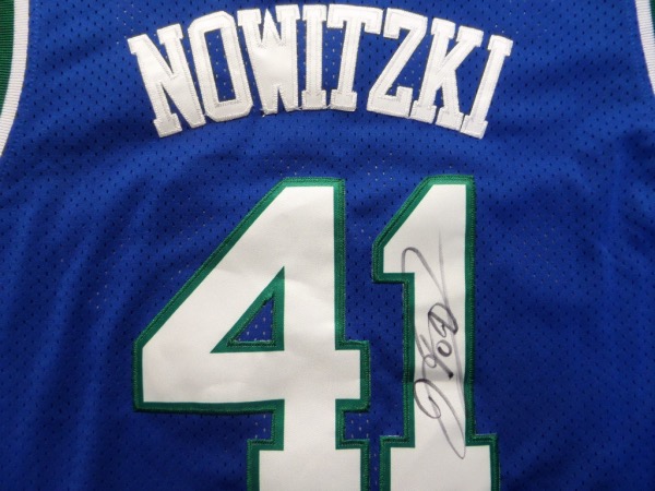 If it's one thing we learned this year, it's how much Mavs fans appreciate the great Dirk Nowitzki!  This blue XXL Mavericks #41 Nowitzki jersey from Adidas is still new with original tagging present, and comes with everything hand sewn.  It is back number-signed in black sharpie by the HOF and all time great himself, and is an absolute MUST for any Dallas Mavericks collection.  Valued into the very high hundreds!