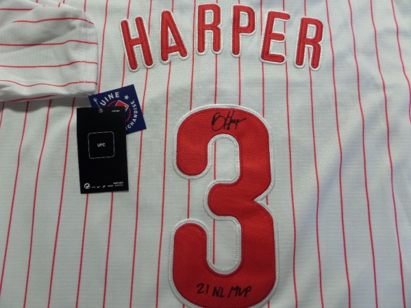 This home white, pinstriped, size L Philadelphia Phillies jersey is from Nike, and comes with original tagging attached, and everything sewn in red and white.  It is back number-signed by the future HOF OF/1b himself, grading a legible 8.5-9, with 21 NL MVP included, and retail is low thousands, especially in Phillies country!