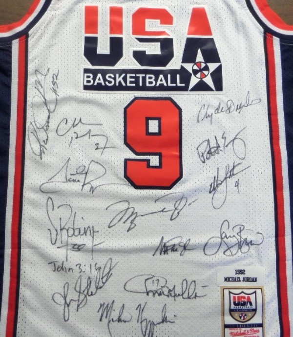 This white size L Mitchell & Ness #9 USA Basketball Michael Jordan jersey is NEW with original tagging attached, has everything sewn, and comes front signed in black sharpie by by all 12 members of the original Dream Team!  Included are Bird, Magic, Jordan, Barkley, Ewing, Drexler, Robinson, Malone, Stockton, Pippen, Laettner, Mullin, and even assistant coach, and NCAA legend, Mike Krzyzewski, and this AWESOME and one of a kind display item books well into the low thousands!