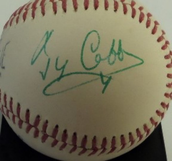 This vintage Worth Official League baseball is still in EX shape overall, and comes hand-signed on a side panel in green ink by original 1936 HOF'er, Ty Cobb.  The signature grades a strong, overall 8, and this wonderful collector's ball is valued well into the thousands!