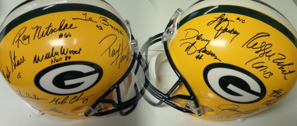 This Lee approved gem is a mint Riddell team helmet, full-sized with metal facemask, and comes black sharpie signed by MANY! I see only Greats, Legends and HOF'ers appearing, grade is a clean 10 all over, and names include: Ray Nitschke, John Brockington, Willie Wood, Paul Hornung, Bart Starr, Don Hutson, Herb Adderley, Reggie White and about 5 more! Wow!!!