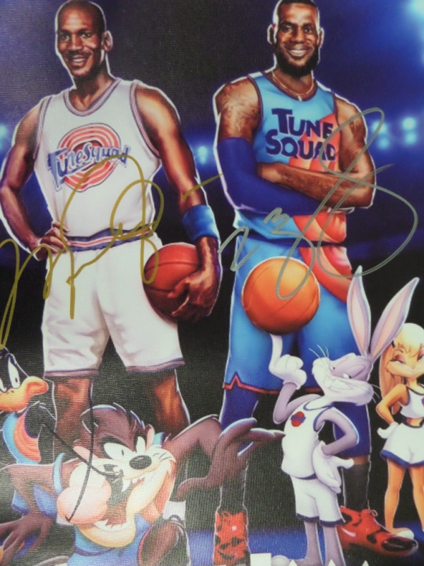 This "Space Jam" color litho print is set on a 19x23 canvas, and is NM and ready for framing and display.  It features color images of the Looney Tunes characters with NBA legends Michael Jordan and LeBron James.  It is hand-signed by BOTH, with MJ in gold and King James in silver, and will frame and display proudly in any basketball OR movie collection!