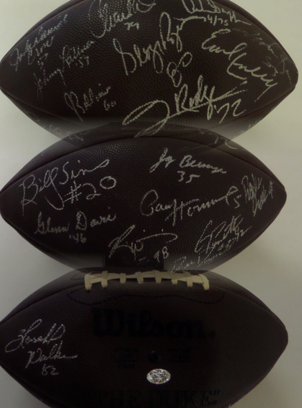 This vintage ball is a Duke from Wilson, comes IN PERSON signed by many winners, and shows off well from 16 feet away. Signers include Herschel, Crow, Lattner, Bellino, Earl Campbell, Salaam, Berwanger, Hornung, Glenn Davis etc. Guaranteed by Lee to be real, and value is close to 2 grand with many deceased!