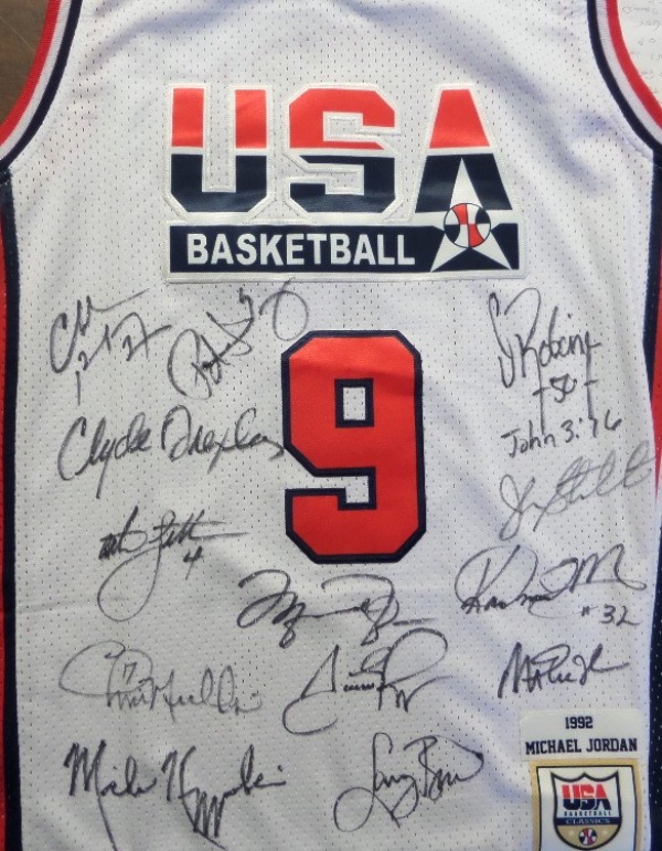 This white size L Mitchell & Ness #9 USA Basketball Michael Jordan jersey is like NEW, has everything sewn, and comes front signed in black sharpie by all 12 members of the original Dream Team!  Included are Bird, Magic, Jordan, Barkley, Ewing, Drexler, Robinson, Malone, Stockton, Pippen, Laettner, Mullin, and even assistant coach, and NCAA legend, Mike Krzyzewski, and this AWESOME and one of a kind display item books well into the low thousands!