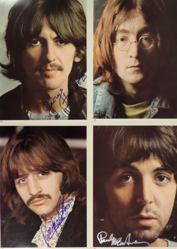 This one of a kind opportunity is FOUR different full color close up Beatles White Album 7.75x10.75 photos, each hand-signed by the Beatle shown.  There is one for each of the Fab Four, including Paul McCartney in silver, John Lennon in blue ink, and George Harrison and Ringo Starr in blue sharpie, and together, valued well into the thousands!!!!