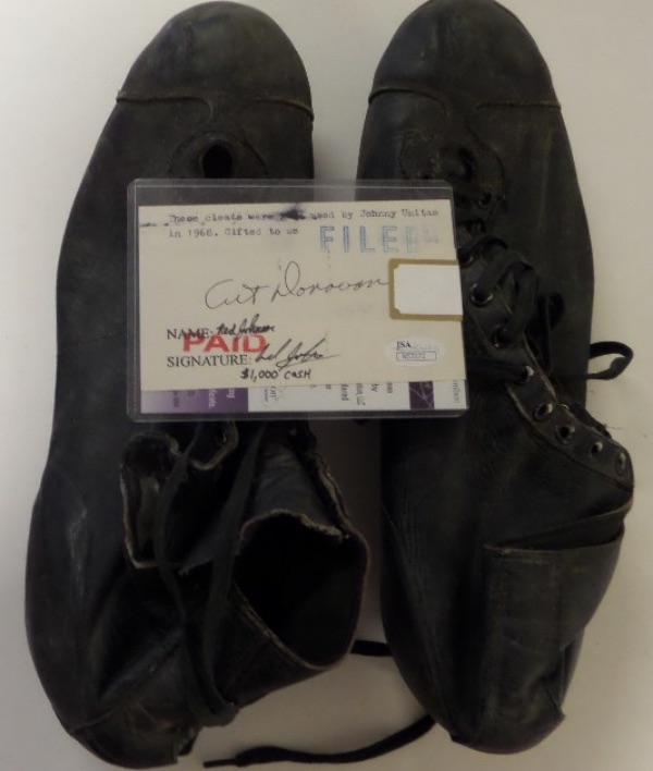 This well used pair of black leather football cleats were actually worn by the "Golden Arm" himself during the 1968 NFL season Baltimore then given to his buddy, teamate and HOF'er Art Donovan. His hand signed, JSA approved note accompanies, and usage is tremendous by the HOF QB. Laces remain, as do the spikes, and value is thousands on this must have, Canton worthy lot. 