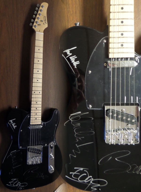 This STUNNING mint black electric beauty comes in box with original carry bag, straps,etc.  It comes signed perfectly in silver by ALL 4 guys. Included are Adam Clayton, Larry Mullen Jr, the Edge and of course the legend Bono.  Guaranteed authentic and retails into the thousands easily.