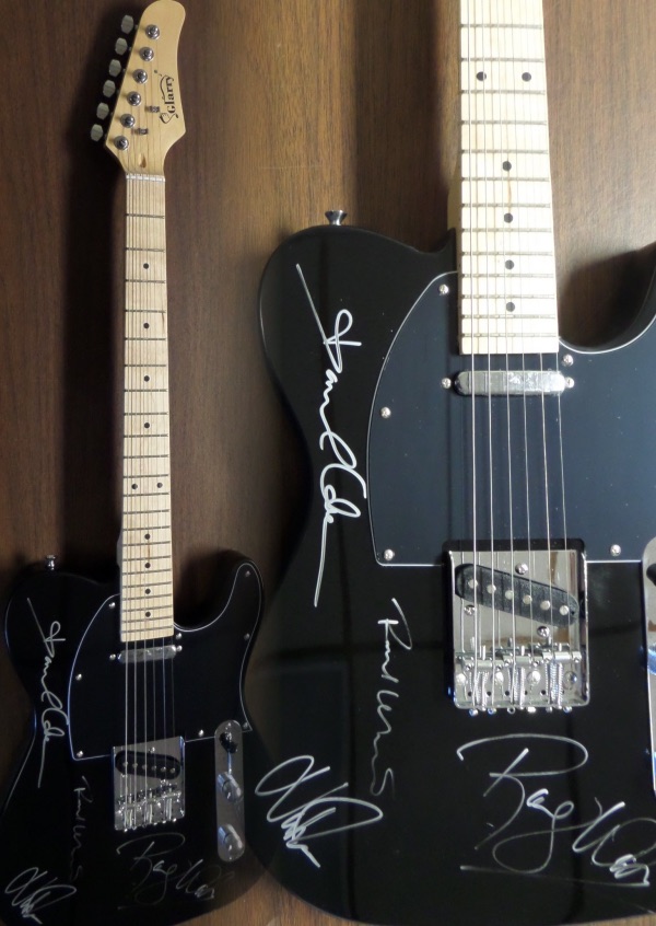 This mint black electric beauty comes in the original box with all accessories included. It is STUNNING and comes signed by ROGER WATERS, DAVID GILMOUR, RICHARD WRIGHT, & NICK MASON!  All of the autographs are in great shape in silver and this retails well into the low thousands from 1 of classic rocks all time great bands. 