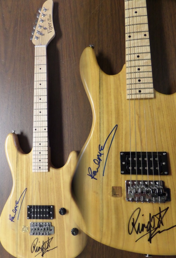 This mint, new electric guitar comes IN PERSON, hand signed by BOTH Paul and Ringo, shows off well from 25 feet away, an comes with THREE photos of my consigner with Paul and Ringo from the signing. Great rock n' roll piece, value is close to 5 grand, and with proof, a buy and hold investment is certain! 