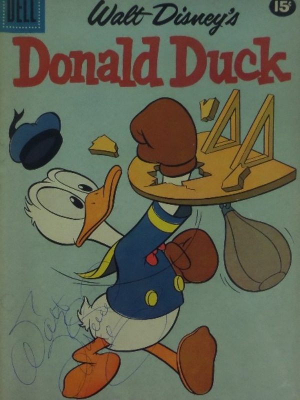 This April 1961 Donald Duck comic from Dell is still in EX overall condition, and comes hand-signed in blue ink on the front cover by the great Walt Disney himself.  The signature holds up well, grading about a 7 overall, and with Disney's death now 57 years ago, retail on this great-looking collector's item is low thousands!