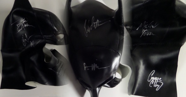 This high quality black mask is in mint shape and comes signed in silver by 6 stars that played the caped crusader on the big screen!  Included are CLOONEY, KEATON, BALE, KILMER, AFFLECK, & PATTINSON!  Sig's are in great shape and display wonderfully.  Guaranteed authentic and i have not seen another around! High retail. 