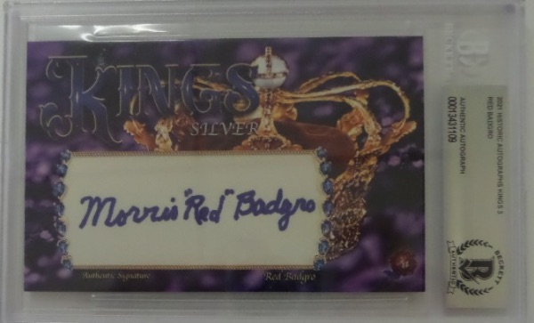 This large collector's card is a 2021 card from Historic Autographs, a large Kings Series 3 card, featuring a cut with the blue sharpie signature of the man who scored the first touchdown in the first NFL Championship game, Morris "Red" Badgro!  Signature is a legible 9, and the card is slabbed authentic by Beckett for your assurance.  Badgro was a two sport star, having spent time in both the NFL and the MLB and IS enshrined in Canton as well.  Valued well into the hundreds!