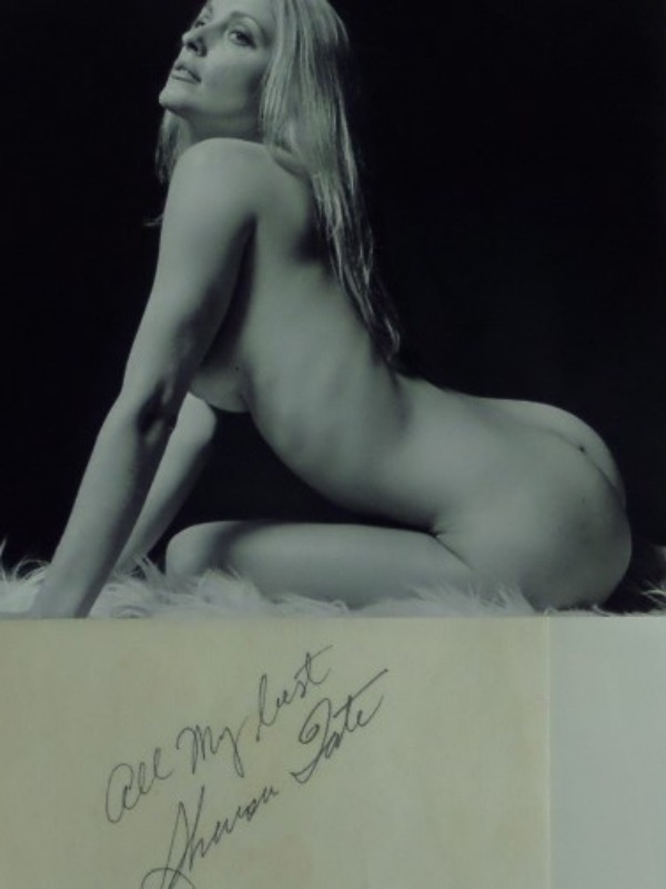 This vintage cut of cream colored paper is just short of 2.5x5 in size, and comes black ink-signed by tragically-slain actress, Sharon Tate.  The signature grades a legible 8-8.5, including an All My Best inscription, and the cut comes with a super SEXY black and white NUDE photo for matting, framing and display.  With her murder now over 55 years ago, retail here is high hundreds to low thousands!  