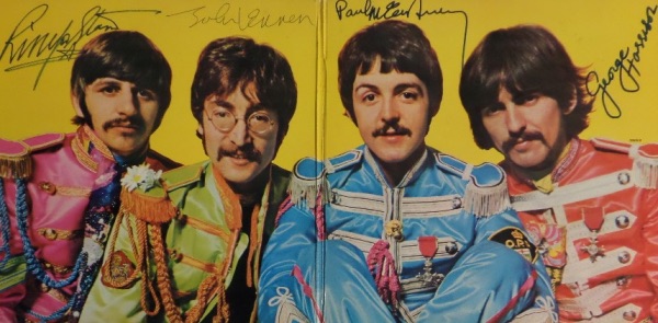 This vintage 1967 "Sgt. Pepper's Lonely Hearts Club Band" LP album is in EX overall shape, and opens to an image of The Fab Four against a yellow background.  It comes ink signed by John Lennon, sharpie signed by Paul McCartney, Ringo Starr and George Harrison, and looks absolutely GORGEOUS!!!  Retail is well into the thousands!