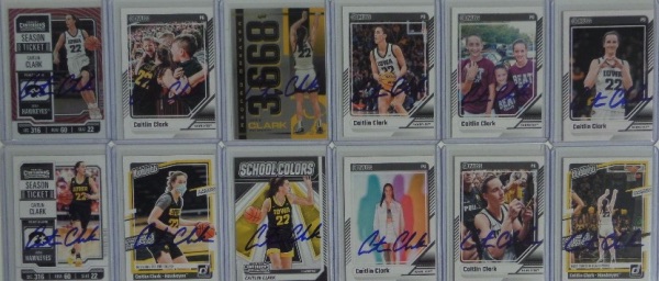 This fantastic group lot is TWELVE different Panini Caitlin Clark basketball cards, each in NM condition or better, and each hand-signed in blue sharpie by the record-smashing Iowa and now WNBA player!  Each can probably retail for low hundreds by itself, and so this group can certainly be high retail!