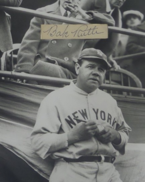 This RARE 1"x2.5" cut is small in size, but comes signed BEAUTIFULLY by the one and only Babe Ruth!  The signature is in black fountain ink and grades a stunning 8 overall! It can be matted/framed carefully and is valued right around $1,000. Great cut that has been meticulously displayed with a photo of the Babe signing autographs