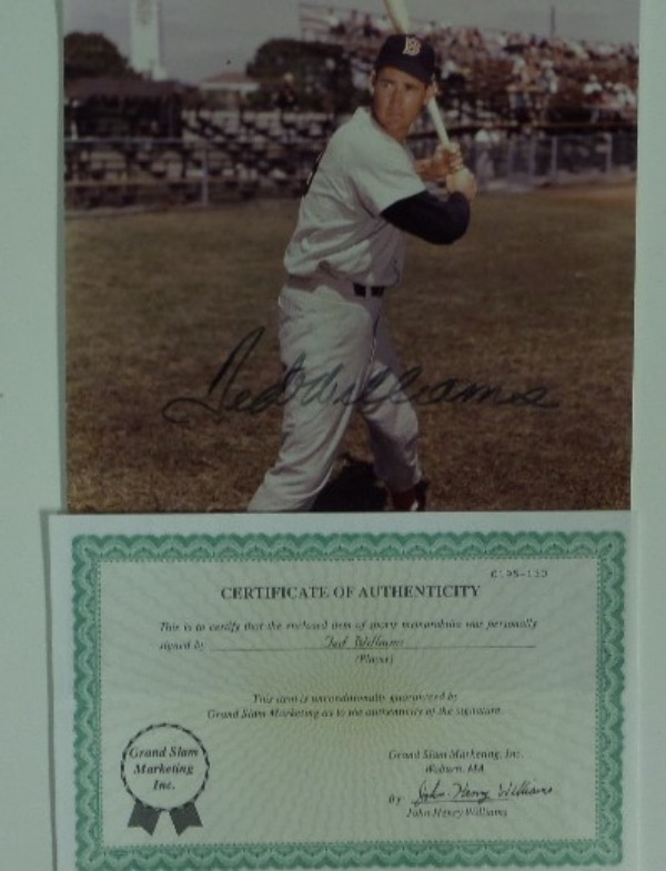 This color 8x10 shows Ted posing with bat in hand and comes signed by this deceased legend nicely in black.  It comes with the original COA from John Henry Williiams for guaranteed authenticity.  Retails in the high hundreds. 