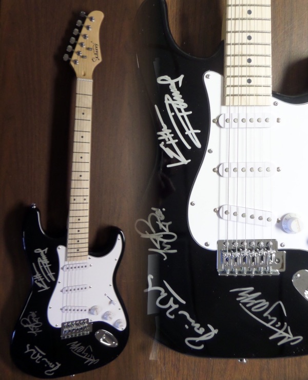 This beautiful black Fender Stratocaster style electric guitar is in MINT condition, and comes hand-signed in silver by all four longtime members of the world's most recognizable rock band, The Rolling Stones.  Signatures are bright, and each grades a legible 8.5 at least.  Included are Ron Wood, Mick Jagger, Charlie Watts and Keith Richards, and with Watts' recent passing, the already sky-high retail value of this baby shoots ever upward!