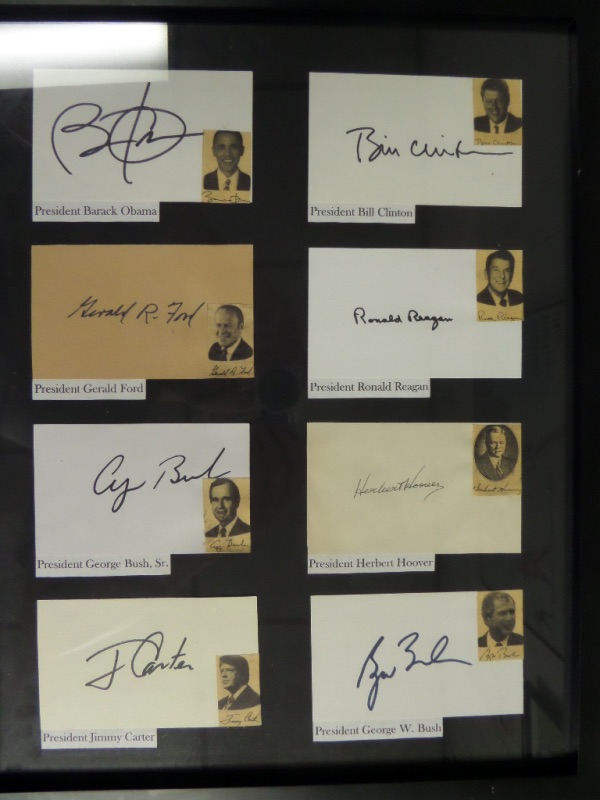 This one of a kind, custom matted and framed (with UV glass) wall hanging is about 16x20 in size and holds eight high value Presidential signatures. Amongst the signers are Both Bush's, Carter, Reagan, Obama, Hoover, Clinton and Ford. All 8 signatures are spectacular, and value is HUUUUUGE on this must have lot. 