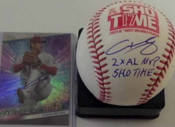 This Angels "ShoT17me" logo baseball is in NM/MT condition, and comes side panel-signed in blue ink by the AL MVP himself, pitcher/outfielder, Shohei Ohtani.  Signature here is an 8.5 at least, including 2X AL MVP and SHO TIME inscriptions, and the ball is valued well into the hundreds, AND, as an added bonus, you will also receive an autographed Ohtani baseball card to boot.  This will make for a spectacular display!