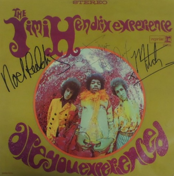 This vintage 1967 "Are You Experienced" LP album cover from The Jimi Hendrix Experience is in EX overall condition, and comes front cover-signed in black ink by the long-deceased guitar great himself, and in black sharpie by Noel Redding and Mitch Mitchell.  The signatures grade strong, legible 8's overall, and with Hendrix untimely and tragic death over FIFTY years ago, this piece values into the low thousands!!!