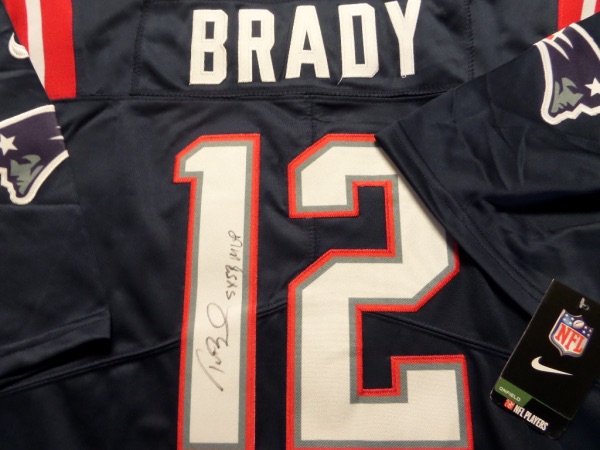 This mint dark blue authentic Patriots jersey comes signed by Tom Terrific on the back in black with this great inscription added.  Retail value well into the thousands as the retired Tom is very unlikely to do any shows and this is guaranteed authentic.  WOW!