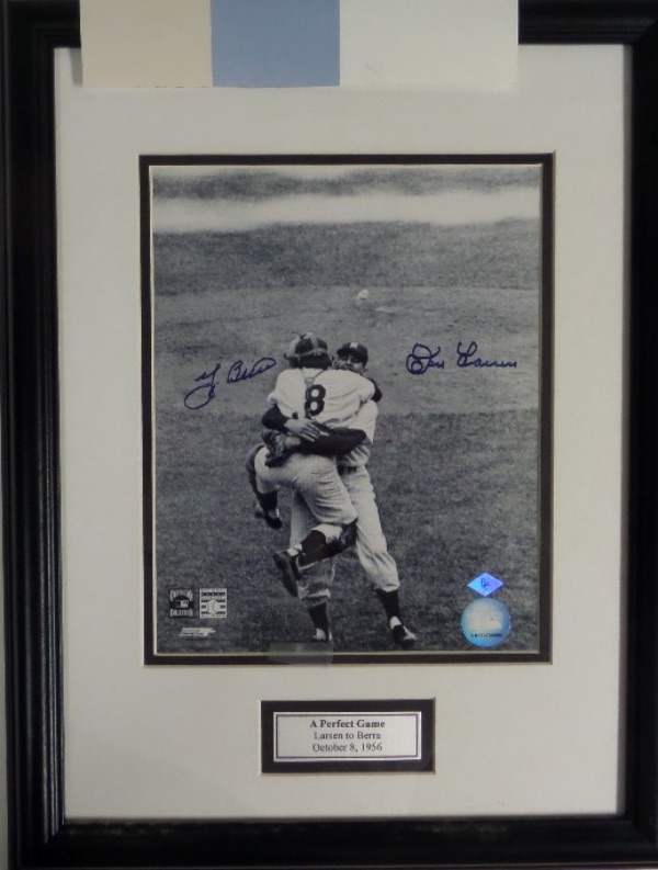 This 1956 World Series photo is 8x10 in size, comes custom PRO double matted and framed in black and white team colors, and holds a BC Sports lifetime certified 8x10 photo of the moment of that Prefect Game. It comes blue sharpie signed perfectly by both pitcher Don Larsen and catcher Yogi Berra, and grades a 10 all over the place. A special Bronx moment, and value is $400.00 or so with both now long deceased. 