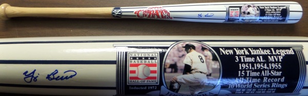 This simply amazing bat is a custom one made by Don and Sharon up at Cooperstown Bat Company, and comes blue sharpie signed by honored HOF'er Yogi Berra. It is well done in Yankee pinstripe fashion, shows off well from 30 feet away, and is valued at $750.00 with our own famous lifetime guarantee attached. 