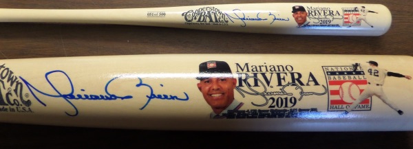 This special bat, made by the unbelievable Cooperstown Bat Company honors Rivera in full color, on a blond natural colored wooden bat, and with TWO color images on the barrel. It comes hand signed IN PERSON in bold blue sharpie, grades a 15 on a 1-10 scale all over, and even comes in the original box. #51/500 in the world, and value is sky high, as it should be!!