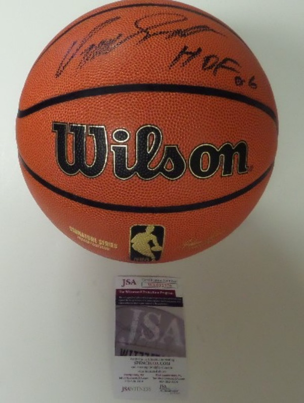 This mint, leather, full-sized and simply perfect basketball is stamped by Wilson from their hi-end signature series, and comes IN PERSON signed by THE "Human Hi-Lite Film" Dominique Wilkins! This gem is a 10 all over, signed in bold, large black marker, and with "HOF 06" written as a bonus. Wow!!!