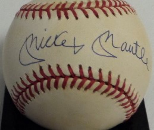 This Official American League Baseball from Rawlings is in VG+/EX overall condition, and comes hand-signed in blue ink right across the sweet spot by one of the game's true legends, Yankees HOF outfielder, Mickey Mantle.  Signature here is a legible 8.5, and with Mantle gone now three decades, retail is high hundreds!