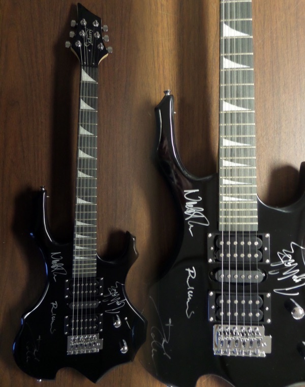 This mint black GORGEOUS electric beauty comes in the original box with all accessories included. It is STUNNING and comes signed by ROGER WATERS, DAVID GILMOUR, RICHARD WRIGHT, & NICK MASON!  All of the autographs are in great shape and this retails well into the low thousands from 1 of classic rocks all time great bands. 