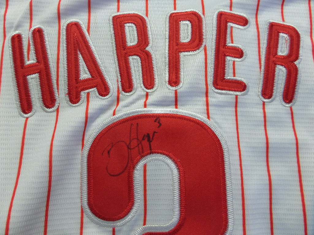 This mint home white pinstriped Phils jersey has sewn on everything and comes signed on the back by this megastar slugger in black with his #3 included! Guaranteed authentic and retails well into the hundreds and rising.  A must for the Fightin Phils fan and hopefully we end up in the World Series again this coming year!