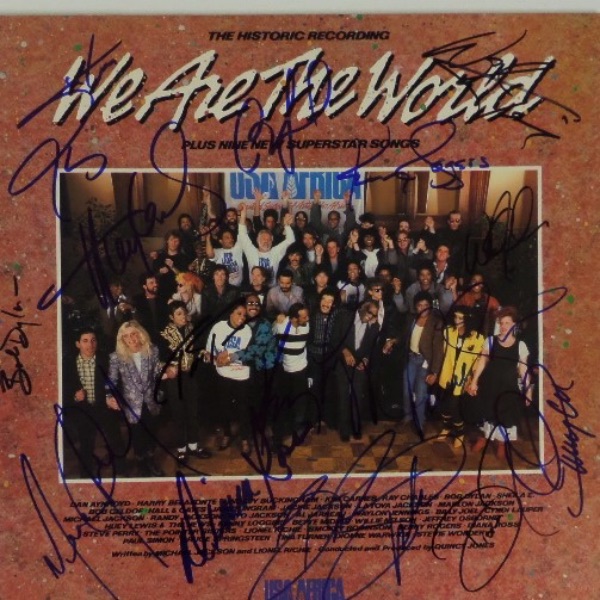 This original 1985 "We Are The World" LP album by the one time band, USA For Africa is in EX/MT condition, and comes front cover signed in blue and black sharpie by 15 members of this group.  Included are Michael Jackson (dec), Billy Joel, Willie Nelson, Waylon Jennings (dec), Diana Ross, Paul Simon, Kenny Rogers, Kenny Loggins, Quincy Jones (dec), Dionne Warwick, Steve Perry, Huey Lewis, Bruce Springsteen, Bob Dylan, and Tina Turner (dec), and this amazing piece of music history values into the THOUSANDS!!!