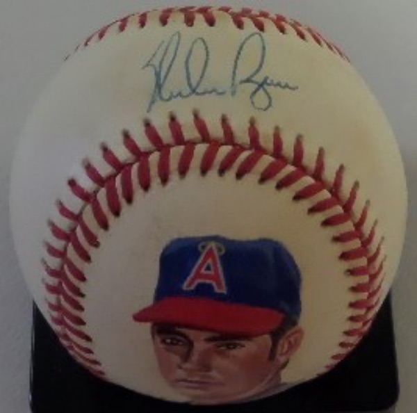 This 1989 era ball is official from the AL, comes blue ink, sweet spot signed by the HOF fireballer, and has a one of a kind Gregg Packer hand painted face image as well. It shows Nolan as a 1973 Calif. Angel, shows off really well from 20 feet away, and value is mid to upper hundreds on the "Ryan Express" collectible. Don't wait for another to be auctioned off!