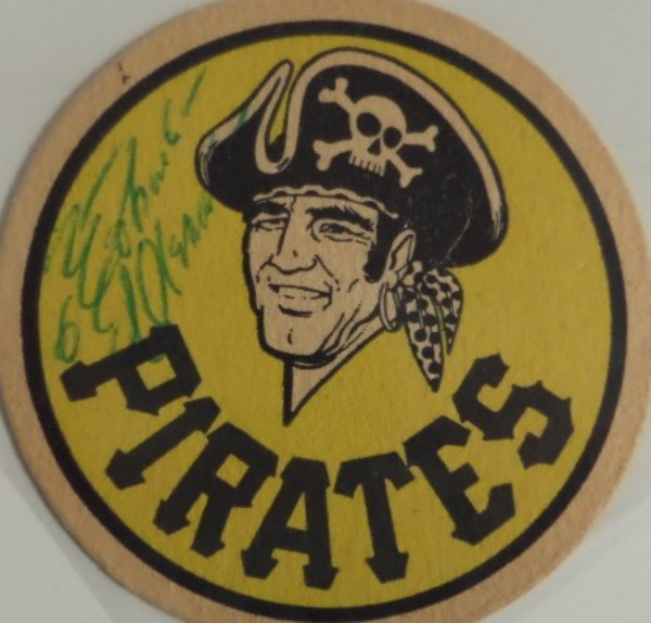 This 3.5" diameter Pittsburgh Pirates team logo drink coaster from Iron City Beer is still in EX shape overall, and comes hand-signed in green ink by their most famous HOF'er, all time great outfielder, Roberto Clemente.  The signature grades about a 7 overall, and with Clemente's death now a half century ago, retail is low thousands!